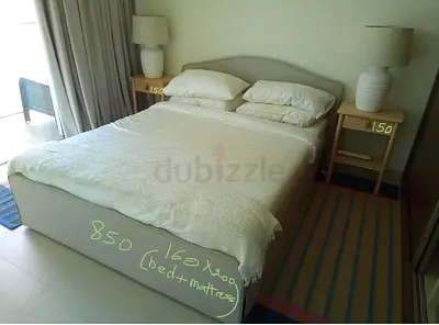 Bed and Mattress along with Bedside Tables