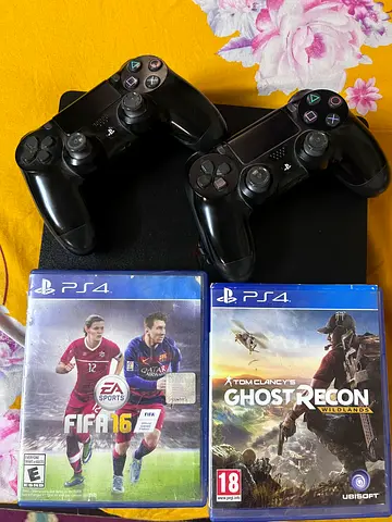 PlayStation 4 (1 TB ) console with 2 controllers + Witcher 3 and Ghost Recon