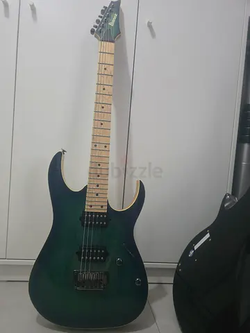Ibanez Teal green electric guitar includes bag