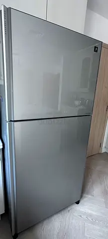 Silver double-door refrigerator, very good working condition