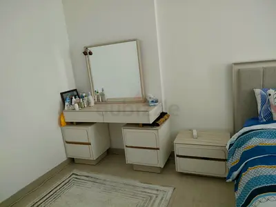 Beige wooden dressing table with mirror