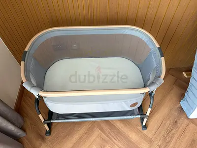 Light grey bedside bassinet / cradle in good condition