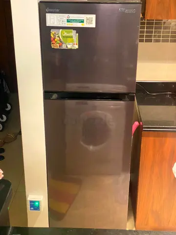 Compact double-door refrigerator with top freezer - good working condition
