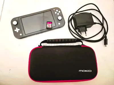 Gray Nintendo Switch Lite with case, original charger and game card - perfect condition