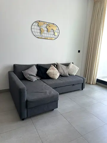 MOVING SALE MUST GO Grey fabric 3-seater sofa with sofa bed- good condition