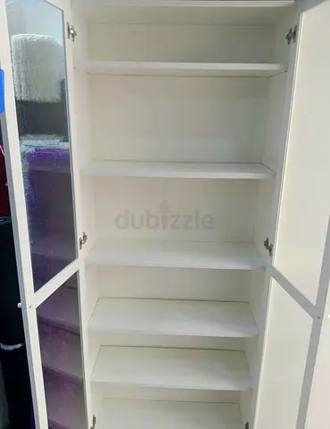 White Tall Storage Cabinet with Glass Doors — Good Condition