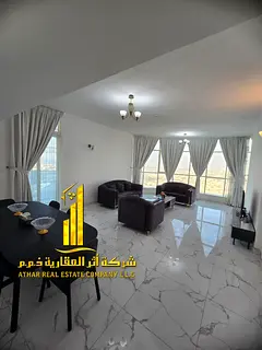 Sea view. A luxurious, brand-new apartment with two bedrooms, a living room, and an open balcony. Aj