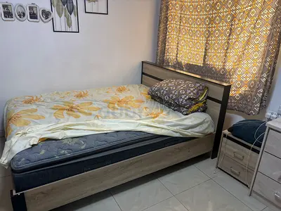 Double bed with costly mattress (under warranty) and bedside drawer and wardrobe in good condition
