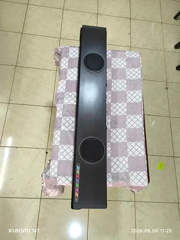 Used slim soundbar with built-in speakers - good working condition