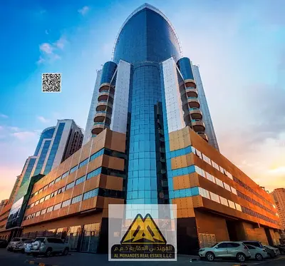 A prime investment opportunity in Orient Towers B: a fully furnished apartment with a spacious layout, master bedrooms, comprehensive amenities, and a