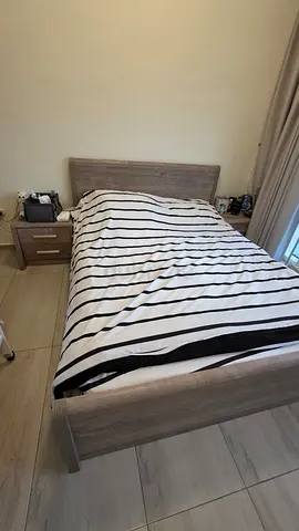 Double bed frame with matching bedside table - light wood finish