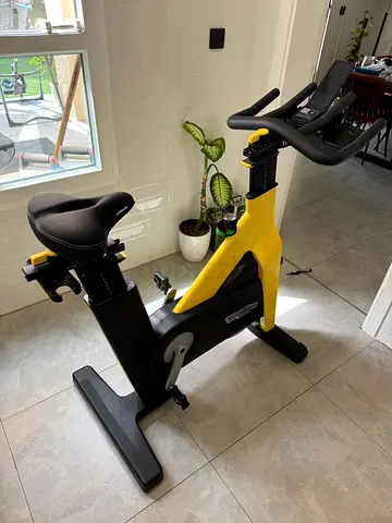 Technogym Upright/Spin Exercise Bike - Excellent Condition with upgraded seat and pedals