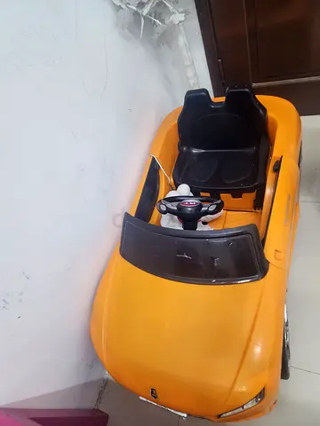 Orange Ride-On Kids Electric Car (single-seater) - Good Condition