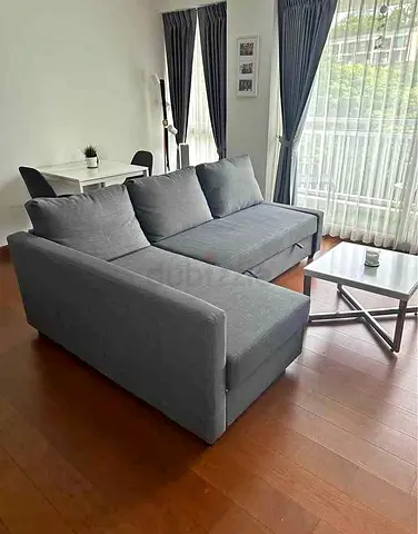 Gray Friheten L-shaped sofa combed (IKEA)