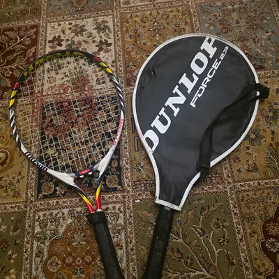 Set of 2 Dunlop tennis rackets. Junior. Preloved. AED. 95 for both!