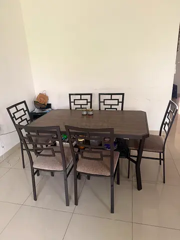 Wooden dining table with 6 metal-frame chairs - good condition