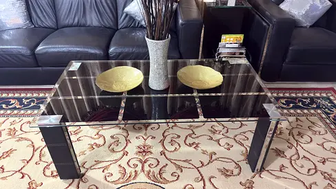 Coffee table with two chairs and accessories