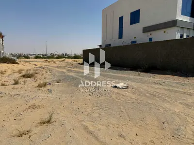 أرض سكنية استثمارية للبيع في الحوشي الشارقة موقع هادئ ومساحة كبيرة