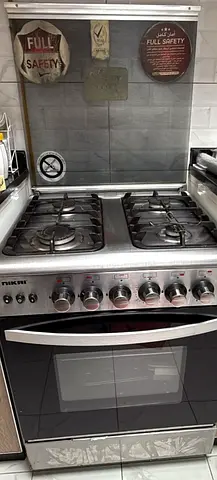 Nikai 4-Burner Gas Cooker with Oven - Good Working Condition