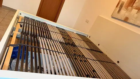 White wooden double bed frame with slatted base - good condition
