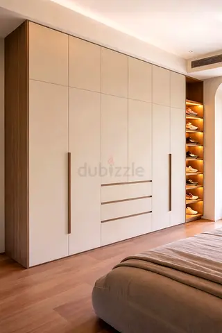 Large built-in modern wardrobe with integrated shoe shelving