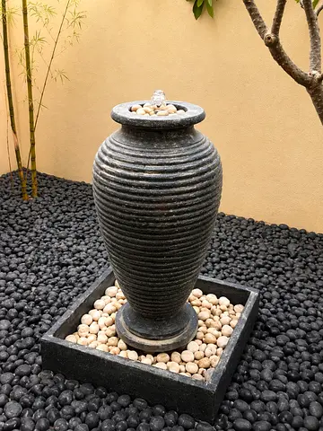 Outdoor stone water urn fountain