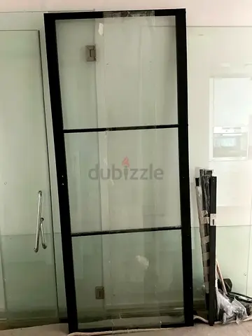 Glass door from vidaxl assembled but wont use asking 650aed