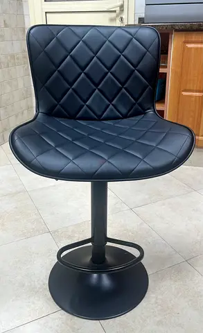 THREE Black Quilted Swivel Bar Stool with Footrest available - Very Good Condition
