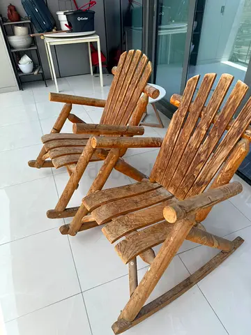 Two Wooden rocking chairs. Outdoor/indoor