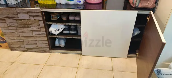 Wooden shoe cabinet with sliding doors — good condition