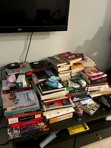 Used mixed collection of English and Arabic books - novels, nonfiction, textbooks