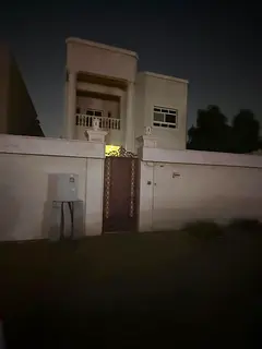 For rent in Al Muwaihat 2: A commercial villa featuring 5 bedrooms, a majlis, 2 living areas, a spac
