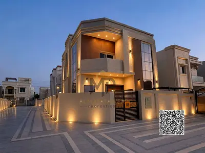 Luxury villa for sale in Al Yasmin with a modern design and high-end finishes, including air condit
