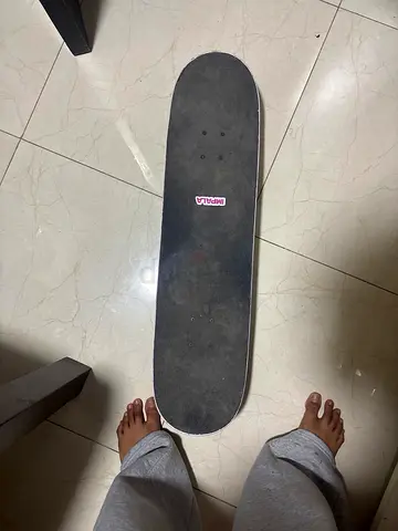 Used street skateboard with grip tape - good condition