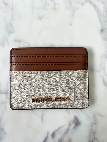 Michael Kors small brown leather wristlet / wallet - used once