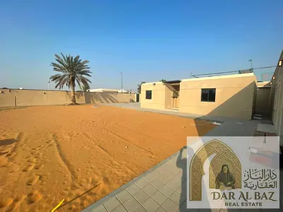Luxury first-occupancy 5BR villa in Al Riffa, Sharjah, with large courtyard, modern finishes, prime location near services and main roads.