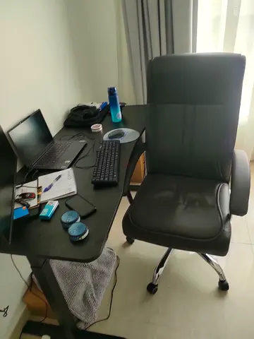 Black ergonomic office chair with armrests - good condition