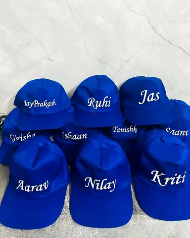 Set of Personalized Blue Baseball Caps with Names - Good Condition