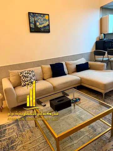 Luxury apartment, second tenant. One bedroom and living room with an open view. Ajman City Tower. Fully furnished for monthly rent.