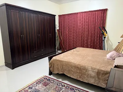 Dark wood bedroom set - double bed with large wardrobe and nightstand