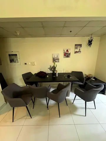 Modern Dark Wood Dining Table with 6 Grey Armchairs