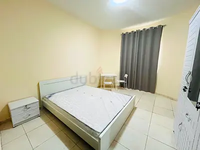 MASTER BEDROOM WITH ATTACHED WASHROOM AND BALCONY AVAILABLE FOR A WORKING COUPLE – AL NAHDA, SHARJAH