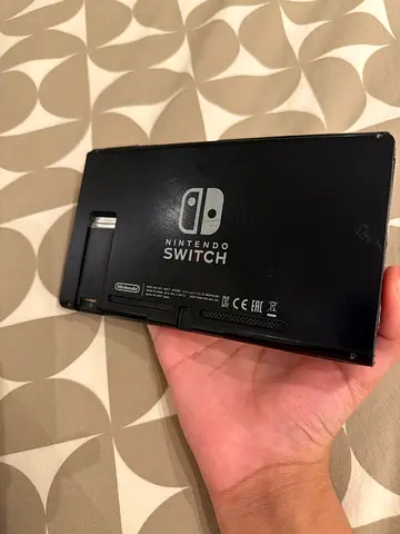 Old nintendo switch used for parts repairable no charger no controller