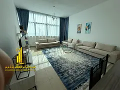 Sea view. Luxurious two-bedroom apartment with a living room and balcony offering an open view. Ajma