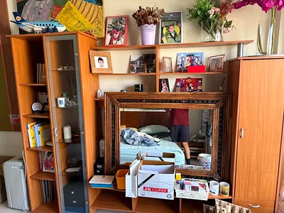 Used solid wood entertainment center with shelves, cabinets and mirror