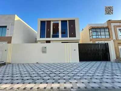 Luxury family villa for sale in Al Zahia, Ajman. Modern design, spacious areas, strategic location directly behind shops.