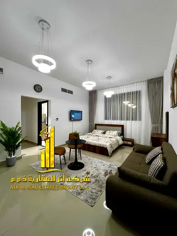 For monthly rent in Ajman - Studio apartment semi-detached kitchen, open view, fully furnished new with elegant furniture and a fully equipped kitchen