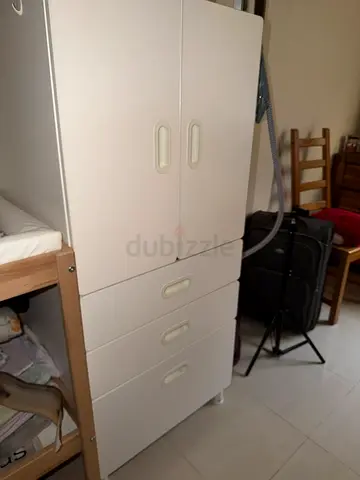 Ideal baby cupboard with hanging space and drawers