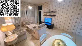 **Furnished two-bedroom apartment with a living room for monthly rent in Ajman One Tower | Near the 