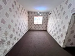 Two-bedroom apartment with a living room for annual rent in Al Rawda 2- Ajman, directly on Sheikh Am